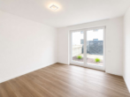 Schlafzimmer - Großzügige 2-Zimmer-Erdgeschosswohnung mit Privatgarten, barrierefreiem Zugang und TG-Stellplatz