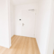 Flur - Großzügige 2-Zimmer-Erdgeschosswohnung mit Privatgarten, barrierefreiem Zugang und TG-Stellplatz