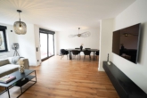Wohnzimmer - Kernsaniertes Reihenhaus in direkter Feldrandlage mit Garten und Garage