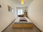 Schlafzimmer 2 - Einziehen und Wohlfühlen – Möblierte Wohnung in bester Altstadtlage in Seligenstadt