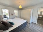 Schlafzimmer 1 - Einziehen und Wohlfühlen – Möblierte Wohnung in bester Altstadtlage in Seligenstadt