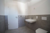 Badezimmer - NEUBAU – ERSTBEZUG – Moderne 2-Zimmer-Wohnung mit Dachterrasse & Smarthome