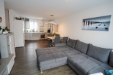 Wohnzimmer - Ihr neues Zuhause in Seligenstadt: Moderne Gartenwohnung mit Terrasse und offener Küche