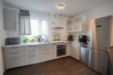 Küche - Ihr neues Zuhause in Seligenstadt: Moderne Gartenwohnung mit Terrasse und offener Küche