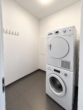 Hauswirtschaftsraum - Wohnen mit besonderem Flair: Lichtdurchflutete 2-Zimmer-Wohnung mit Rundumbalkon und TG-Stellplatz