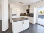 Küche - Wohnen mit besonderem Flair: Lichtdurchflutete 2-Zimmer-Wohnung mit Rundumbalkon und TG-Stellplatz