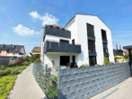 Hausansicht - Privatsphäre, Komfort, Wertstabilität – Stilvolle 4-Zimmer-Wohnung mit Garten Seligenstadt