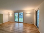 Wohnzimmer - Privatsphäre, Komfort, Wertstabilität – Stilvolle 4-Zimmer-Wohnung mit Garten Seligenstadt